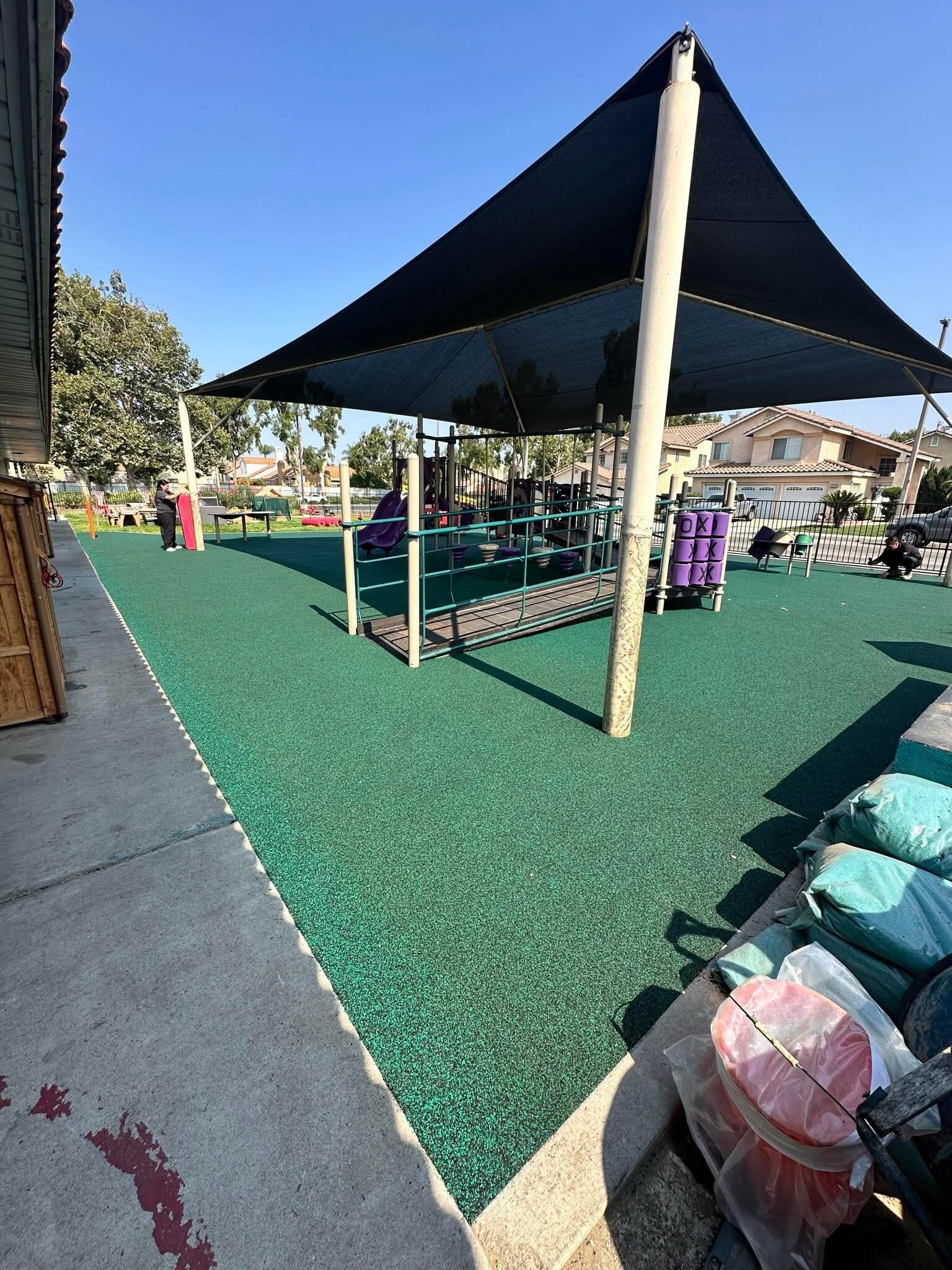 Colorful poured-in-place rubber playground safety surface installed in San Diego, CA by Turbo Surfacing Solutions Colorful poured-in-place rubber playground safety surface installed in San Diego, CA by Turbo Surfacing Solutions