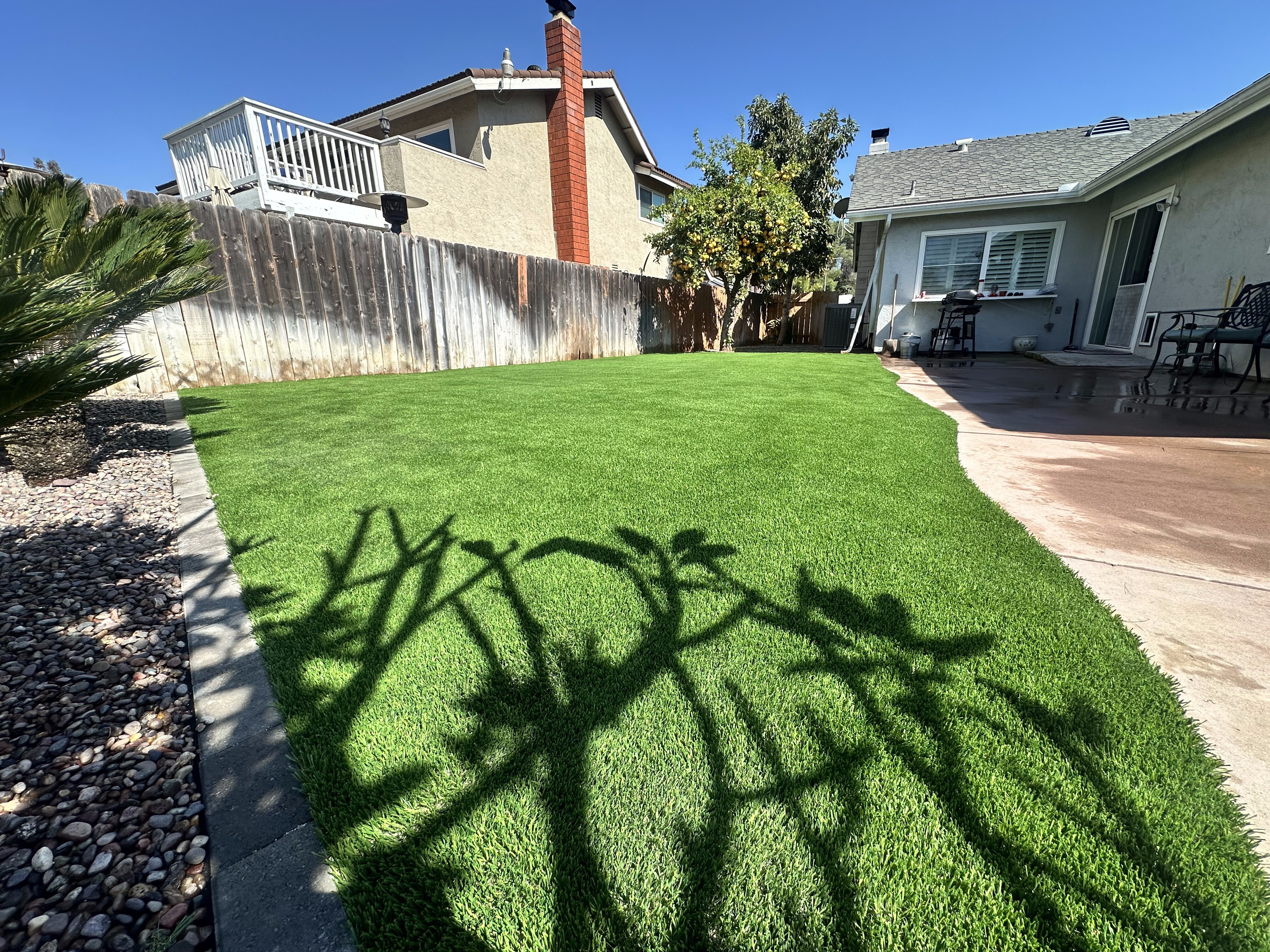 Artificial grass residential backyard lawn installed in San Diego, CA by Turbo Surfacing Solutions Artificial grass residential backyard lawn installed in San Diego, CA by Turbo Surfacing Solutions